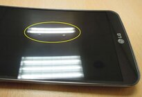 hrbolky na displeji LG G Flex