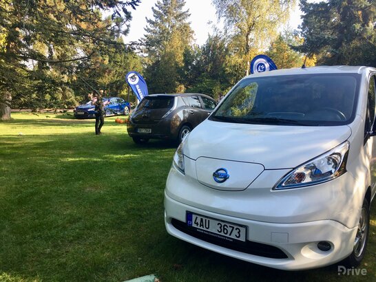 aNissan e-NV200 a Nissan Leaf
