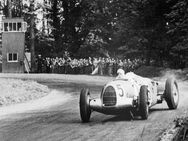 Bernd Rosemeyer na voze Auto Union typ C (1936)