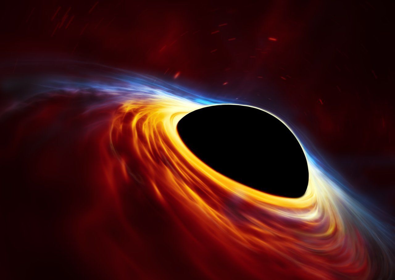 Představa superhmotné černé díry s roztrhanou hvězdou
